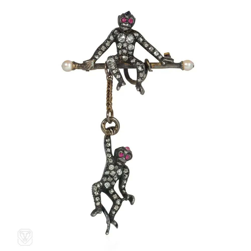 Antique diamond and gem monkey brooch